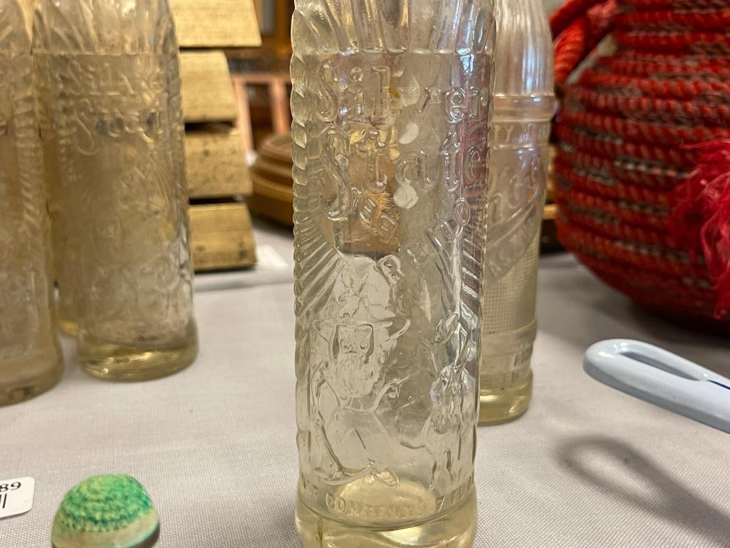 VINTAGE 1940'S SODA POP GLASS BOTTLES INCLUDING SILVER STATE RENO, FARR, TAHOE, AND CRANBERRY GLASS - 8