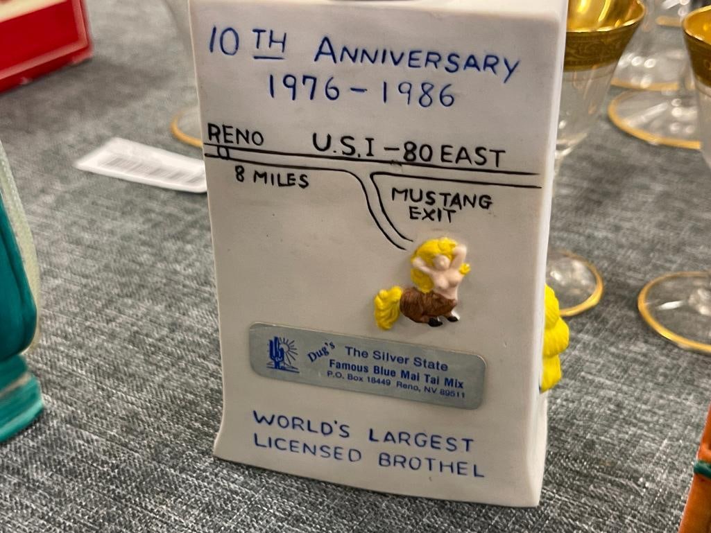 SIX MINIATURE BROTHEL LIQUOR DECANTERS INCLUDING CHICKEN RANCH, JOE CONFORTE'S MUSTANG RANCH, ETC. - 12