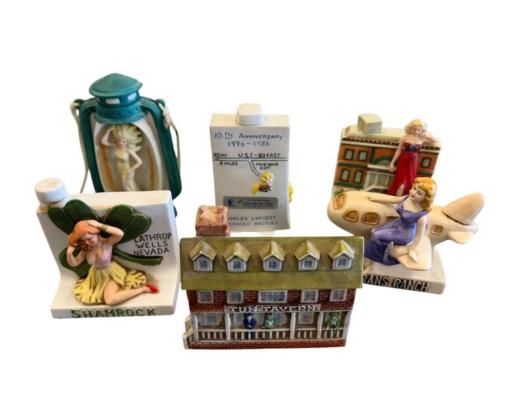 SIX MINIATURE BROTHEL LIQUOR DECANTERS INCLUDING CHICKEN RANCH, JOE CONFORTE'S MUSTANG RANCH, ETC.: ALSO INCLUDES FRANS RANCH BEATTY, NEVADA, YE OLDE TUN TAVERN, SHAMROCK LATHROP, NEVADA, AND THE GREEN LANTERN OF ELY, NEVADA, NO CHIPS OR CRACKS, FIGURAL DESIGNS LARGEST IS 6 1/4" H