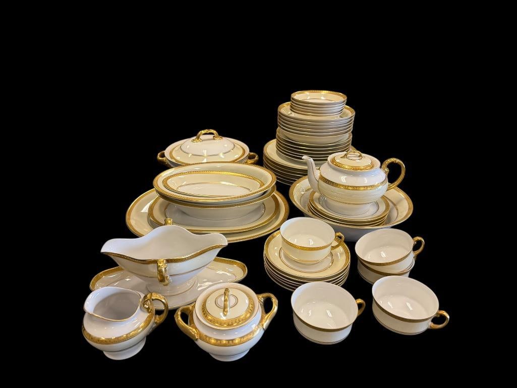 VINTAGE SET OF HEINRICH & CO. SELB BAVARIA CHINA SET FEATURING GOLD ENXCRUSTED RIMS: SEVEN PIECE SERVICE FOR FIVE WITH 11 ADDITIONAL SERVING PIECES INCLUDING PLATTERS, CREAM AND SUGAR, TEAPOT, AND MORE, NO CHIPS OR CRACKS, HALLMARKED ON BOTTOMS DINNER PLATES ARE 10"