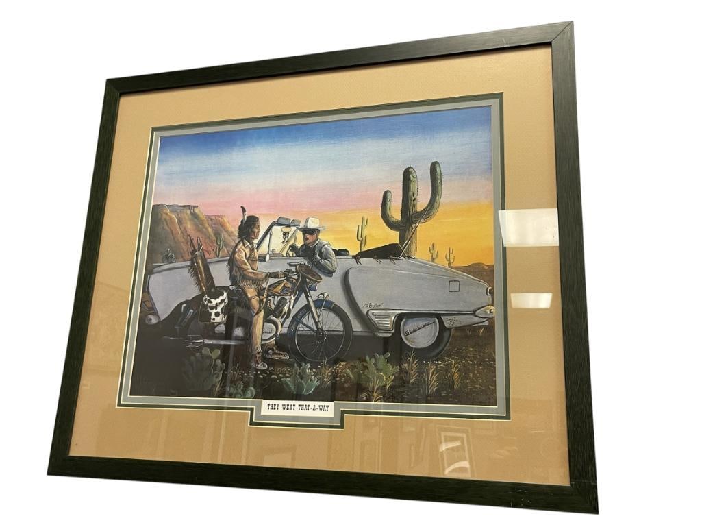 CAMERON BLAGG NATIVE WESTERNER NATIVE AMERICAN ART PRINT TITLED THEY WENT THAT-A-WAY: PRINT DEPICTS ENCOUNTER BETWEEN OUTLAW AND NATIVE AMERICAN MAN ON MOTORCYCLE DECEIVING, DESERT LANDSCAPE SCENE, PLATE SIGNED LOWER LEFT, FRAMED 29 1/2" X 25" FRAME