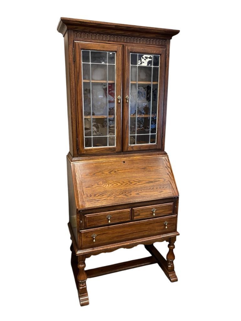 ETHAN ALLEN ARTS AND CRAFTS STYLED DROP FRONT SECRETARY'S DESK WITH BOOKCASE TOP: TWO PIECE DESK, INCLUDES KEY, KEY HOLE TRIM IS MISSING, BOOKCASE TOP FEATURES LEAD GLASS WINDOWS 33" X 20" X 78"