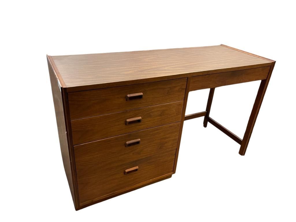 MID-CENTURY MODERN STYLED VINTAGE WRITING DESK: FIVE-DRAWER DESK WITH SOME CRAFTING SUPPLIES, THREAD, BUTTONS, ETC., LEFT TOP EDGE HAS A SMALL CHIP ON THE EDGE 48" X 17 1/2" X 28 1/2"
