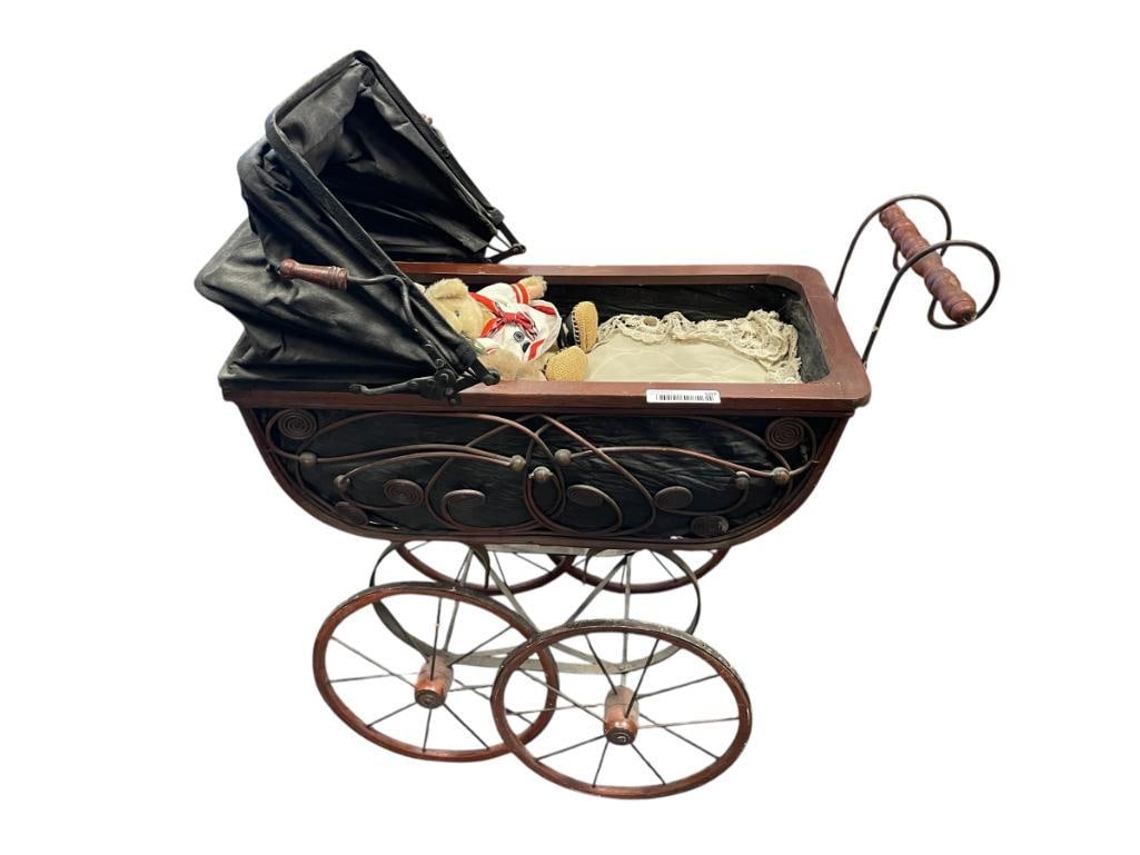 ANTIQUE STYLED DOLL CARRIAGE: CARRIAGE IS CRAFTED FROM WOOD, METAL, WICKER, AND FABRIC, INCLUDES TWO PILLOWS WITH LACE EDGE,AND TWO BEARS 24" X 12" X23" CARRIAGE 