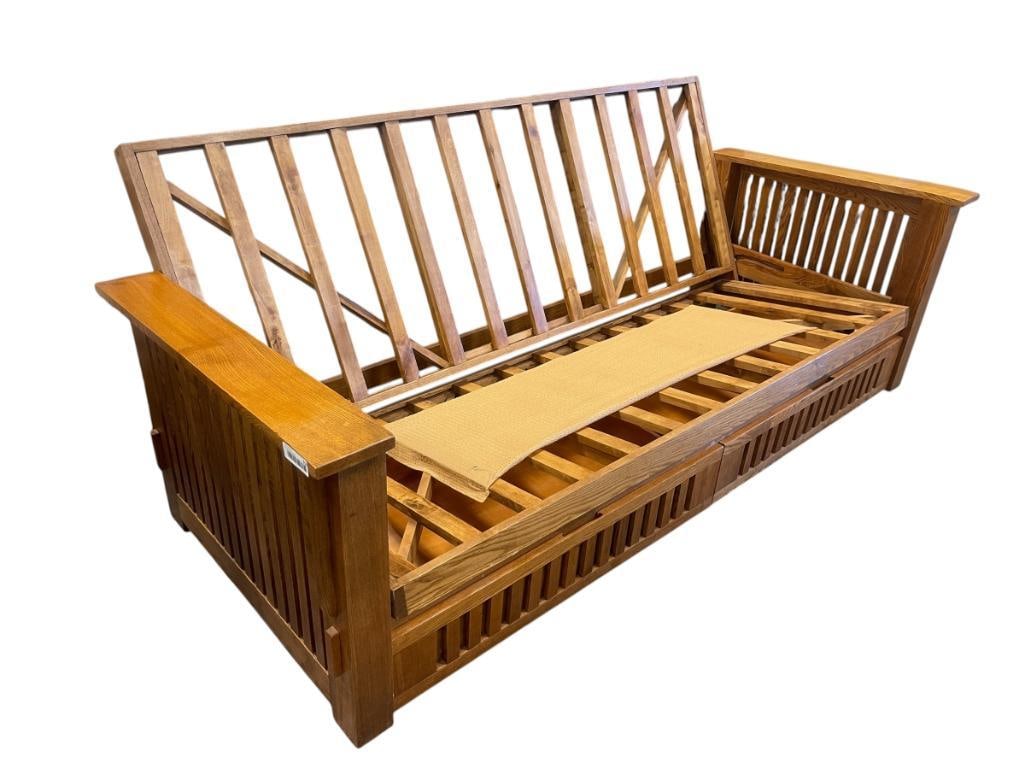 MISSION STYLE OAK FUTON FRAME WITH TWO MATCHING STORAGE DRAWERS: MISSING CUSHION, FRAME IS IN GOOD CONDITION 85" X 38" X 32" 