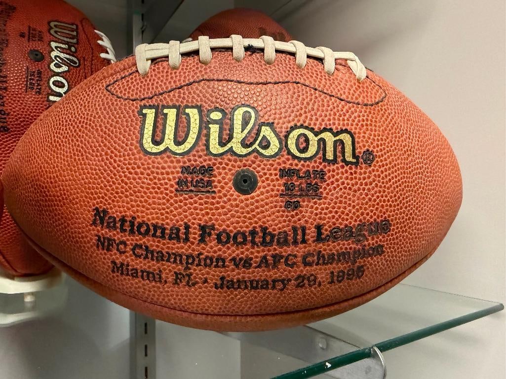 FOUR OFFICIAL NFL FOOTBALL. WILSON GAME BALL FOOTBALLS AND ONE WILSON THE DUKE METALLIC GOLD EDIT... - 4