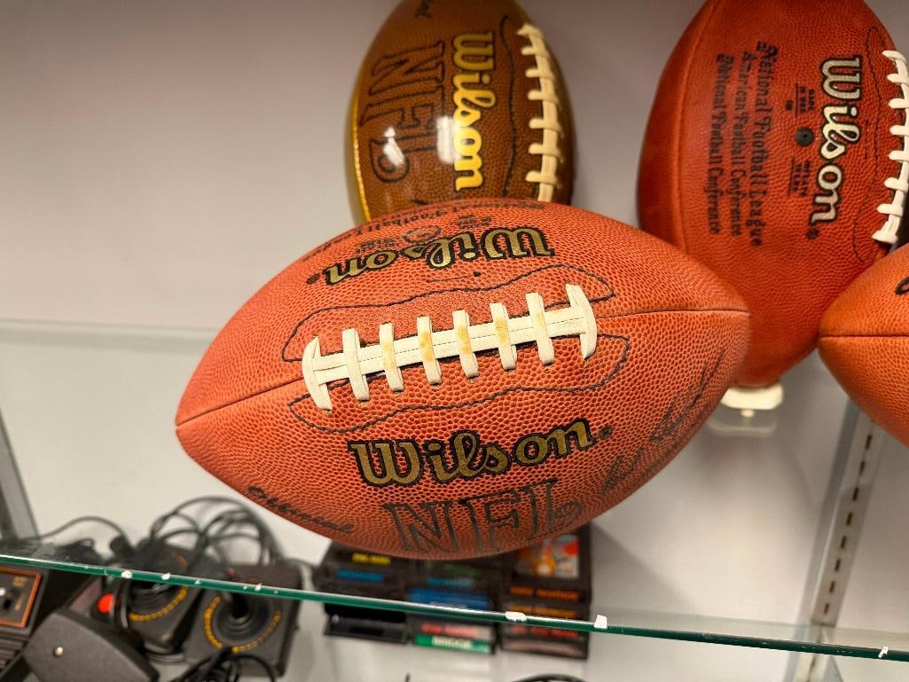 FOUR OFFICIAL NFL FOOTBALL. WILSON GAME BALL FOOTBALLS AND ONE WILSON THE DUKE METALLIC GOLD EDIT... - 7