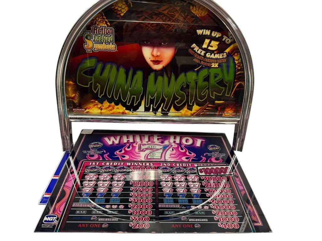 SLOT BELLY CASINO SLOT MACHINE GLASS INCLUDING CHINA MYSTERY BY KONAMI, WHITE HOT 7 BY IGT, AND M...: ALSO INCLUDES RED, WHITE, AND BLUE BY IGT, WHITE HOT 7 HAS CHIP IN GLASS AT BOTTOM, OTHERS ARE IN GOOD CONDITION LARGEST IS 21" X 14"