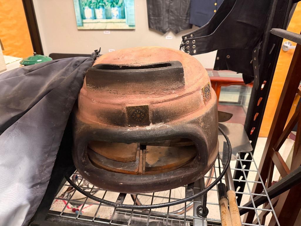 RAVENNA POTTERY PIZZA OVEN: PERFECT FOR MAKING BRICK OVEN PIZZA THIS SUMMER, FEATURING POTTERY OVEN WITH CLAY TILE INSERTS AND METAL BASE, INCLUDES COVER, PIZZA PEEL SPATULA, AND UTENSIL 18" X 18" X 13" OVEN, STAND IS 4" H 