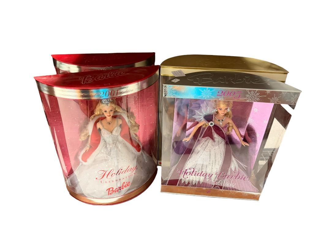 FOUR COLLECTIBLE MATTEL BARBIE DOLLS INCLUDING SPECIAL EDITIONS FROM 2000, 2001, AND 2005: INCLUDES 2000 CELEBRATION BARBIE MATTEL # 28269, TWO 2001 HOLIDAY CELEBRATION MATTEL # 50304, AND 2005 BOB MACKIE HOLIDAY BARBIE MATTEL # G8058, ALL IN ORIGINAL PACKAGING 