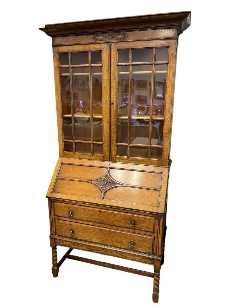 QUARTER SAWN OAK ARTS AND CRAFTS PERIOD ANTIQUE DROP FRONT SECRETARY'S DESK / BUREAU BOOKCASE TOP: ONE PIECE DESK FEATURES BARLEY TWIST FRONT LEGS, CARVED DROP FRONT, PANELED DOORS, MISSING KEY 36" X17" X 78"