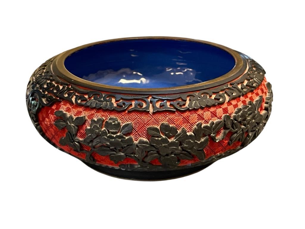 MID-20TH CENTURY CARVED RED AND BLACK CINNABAR LACQUERED BRUSH POT: INTRICATELY CARVED FLORAL AND LEAF DESIGN WITH BLUE ENAMELED INSIDE AND BOTTOM, IN GOOD CONDITION 7 3/4" ROUND 