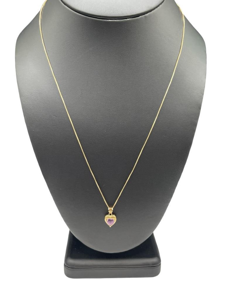 14K YELLOW GOLD AMETHYST HEART PENDANT NECKLACE: NECKLACE IS MARKED ITALY 20" NECKLACE, 5/8" PENDANT, 6MM AMETHYST, 2.59 GRAMS 