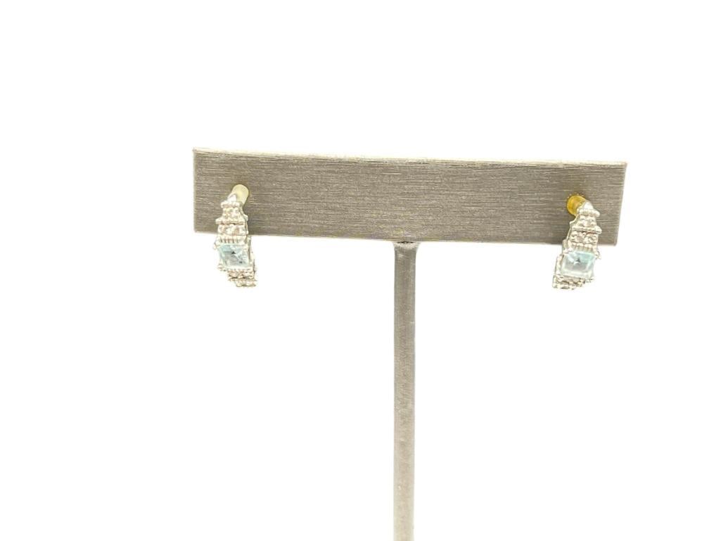 STERLING SILVER BLUE TOPAZ AND CZ POST EARRINGS: FEATURING PRINCESS CUT TOPAZ 5/8", 5MM TOPAZ, 2.49 GRAMS 