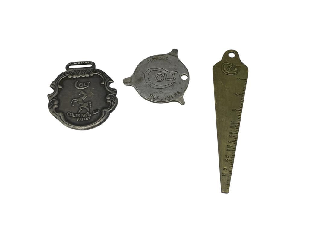 VINTAGE COLT FIREARMS WATCH FOB, THREE POINT TOOL FOB, AND BRASS BORE GAUGE (1 of 6)