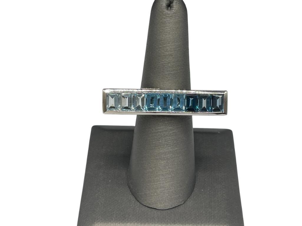 STERLING SILVER EMERALD CUT BLUE TOPAZ RING FEATURING VARIOUS SHADES OF TOPAZ (1 of 5)