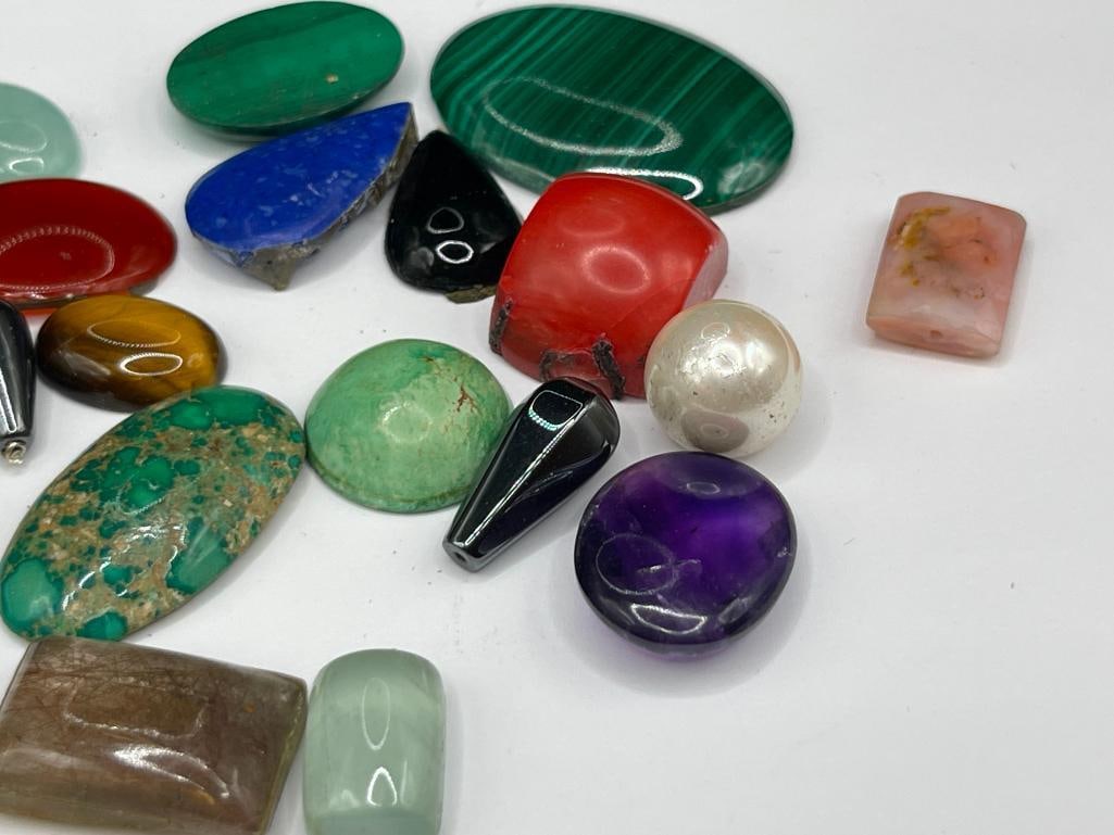 ASSORTED GEMSTONES FEATURING MALACHITE, AMBER, AMETHYST, CORAL, AND SIMULATED STONES - 5