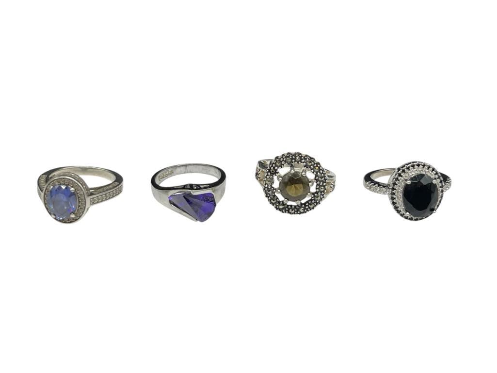 FOUR FASHION RINGS INCLUDING TWO STERLING AND TWO SILVERPLATED (1 of 5)