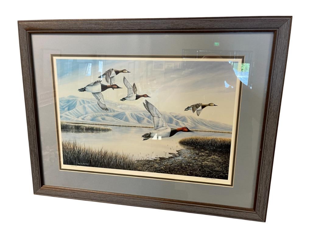 WILLIAM A. MOORE NEVADA ARTIST LIMITED EDITION PRINT CANVAS BACK DUCKS STILLWATER CANVASBACKS: WILLIAM A. MOORE WAS A WELL KNOWN NEVADA ARTIST FOR NATIVE AMERICAN AND WILDLIFE SUBJECTS, PRINT DEPICTS CANVAS BACK DUCKS IN FLIGHT WITH MARSH BACKGROUND, SIGNED LOWER RIGHT, NO. 404/750, FRAMED 