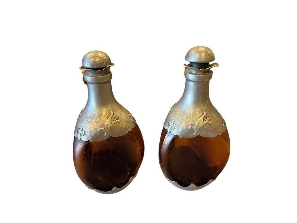 ZEISTER PEWTER VINTAGE AMBER WHISKY / DECANTERS WITH PEWTER OVERLAY BOTTOM, TOP AND CORK STOPPER: HAMMERED AND EMBOSSED DESIGN ON PEWTER OVERLAY 10" H 
