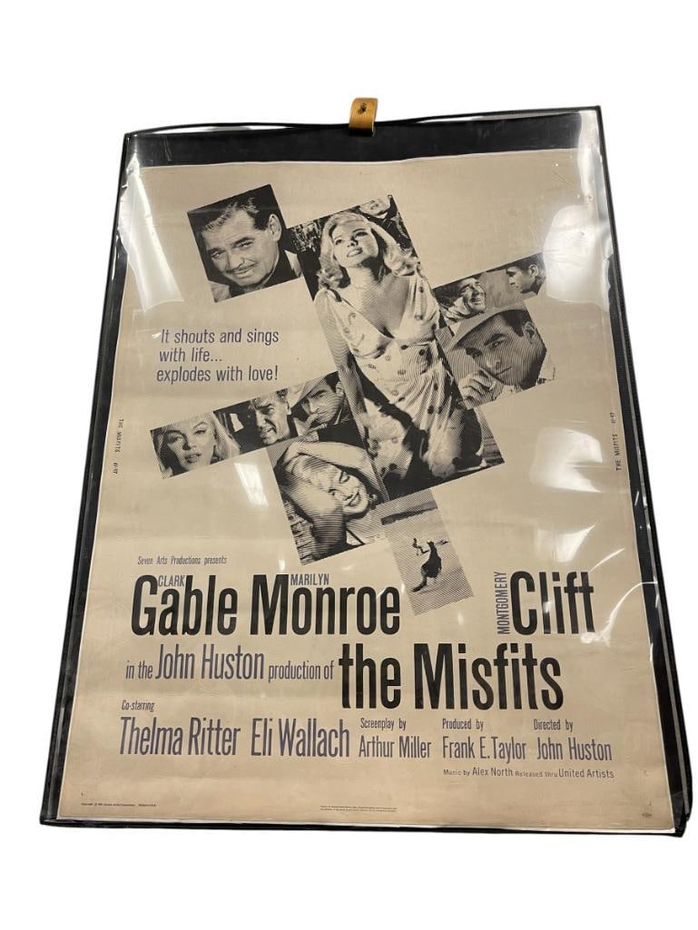 1961 VINTAGE MOVIE POSTER THE MISFITS STARRING MARILYN MONROE, CLARK GABLE, MONTOGOMERY CLIFF: UNITED ARTISTS CORPORATION, UNFRAMED, SLEEVE INCLUDED, PIN HOLES IN THE CORNERS 30" X 40" 