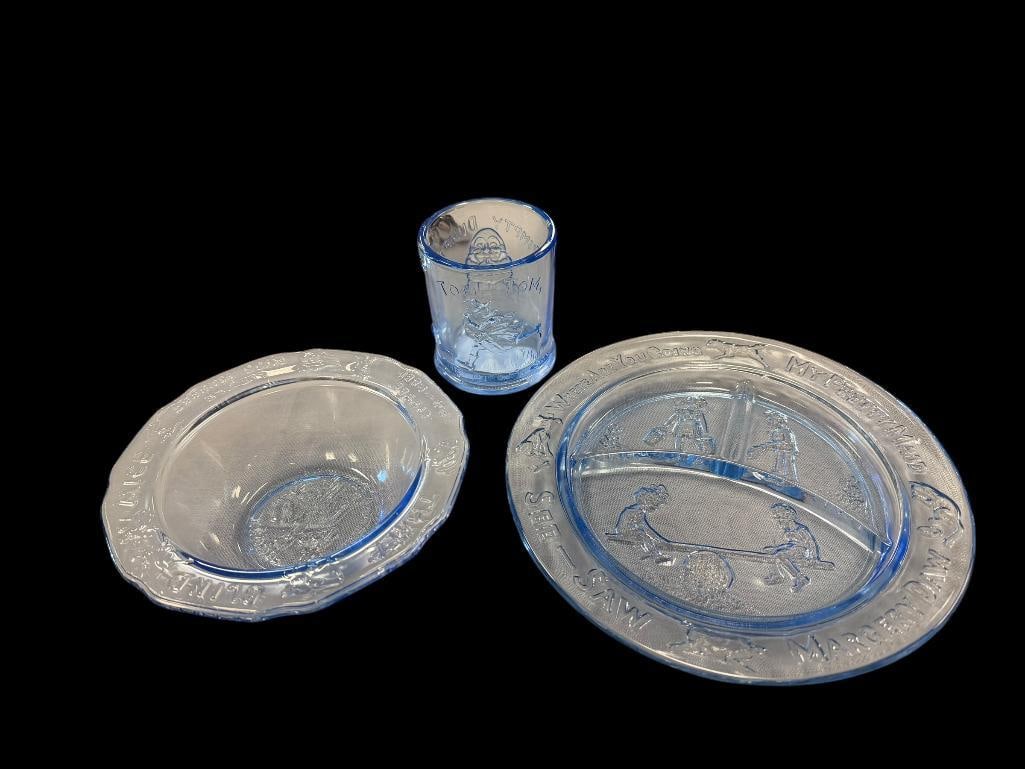 THREE PIECE VINTAGE TIARA BLUE INDIANA GLASS EXCULSIVE NURSERY RHYMES DISH SET: CIRCA 1970'S, NO CHIPS OR CRACKS, INCLUDES HUMPTY DUMPTY, MARGERY DAW, AND MORE LARGE PLATE IS 8 1/2" 