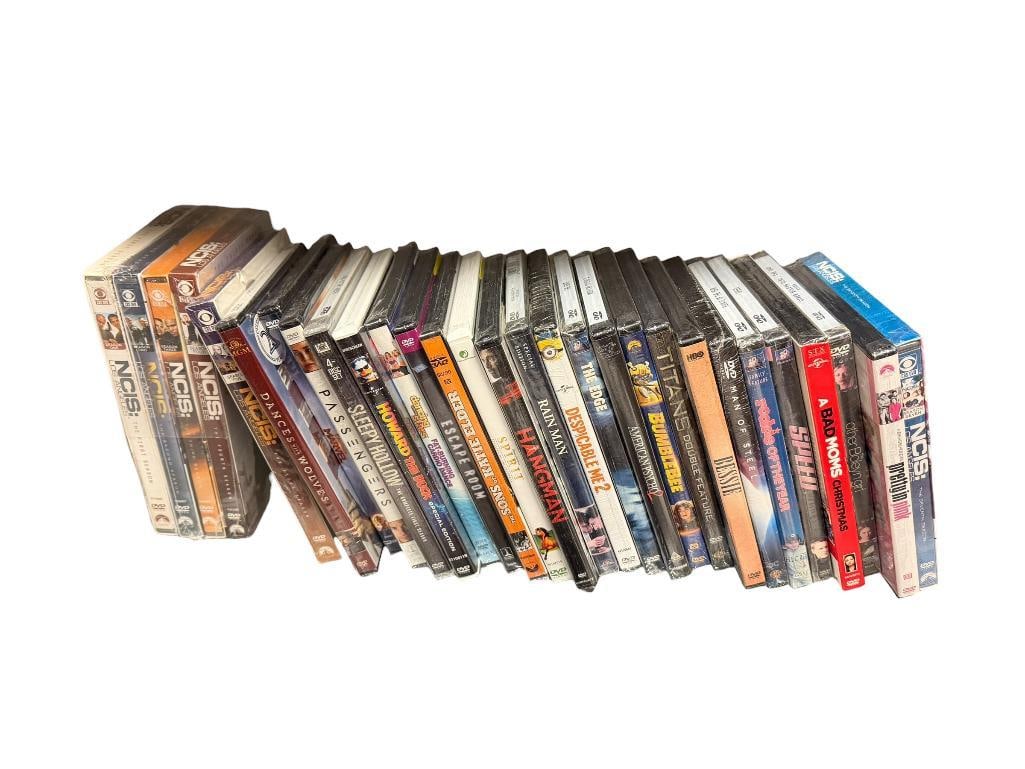 29 ASSORTED NEW SEALED IN PACKAGING DVDS FEATURING MOVIES AND TV SHOWS INCLUDING NCIS: GREAT COLLECTION FEATURING VARIOUS GENRES 