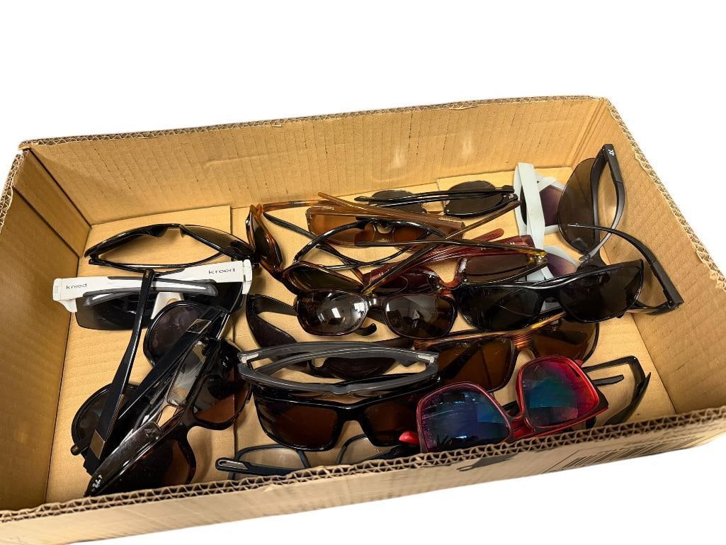 COLLECTION OF HIS AND HERS SUNGLASSES: FEATURING VARIOUS BRANDS AND STYLES 