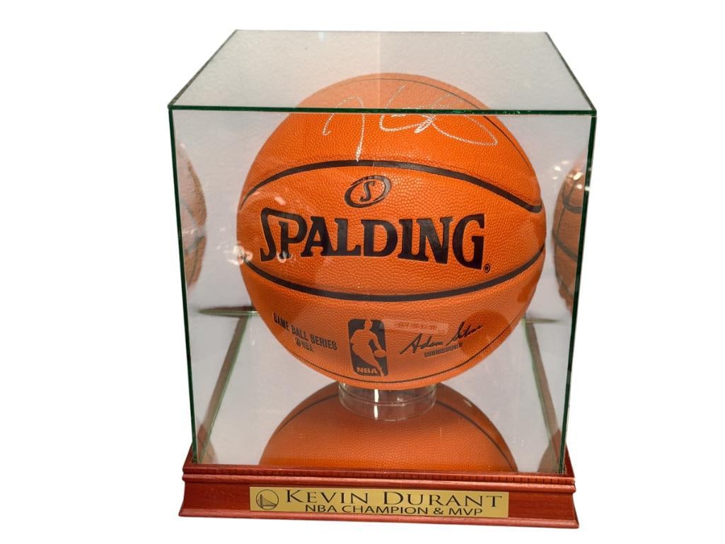 KEVIN DURANT 2X NBA CHAMPION AUTOGRAPHED BASKETBALL AUTHENTICATED BY SPORTS GALLERY: KEVIN DURANT IS CONSIDERED ONE OF THE GREATEST SCORERS OF ALL TIME WITH CAREER ACCOMPLISHMENTS SUCH AS 2020 OLYMPICS MVP, 4X NBA SCORING CHAMPION, 16X NBA ALL-STR, SPALDING BASKETBALL IS SIGNED IN