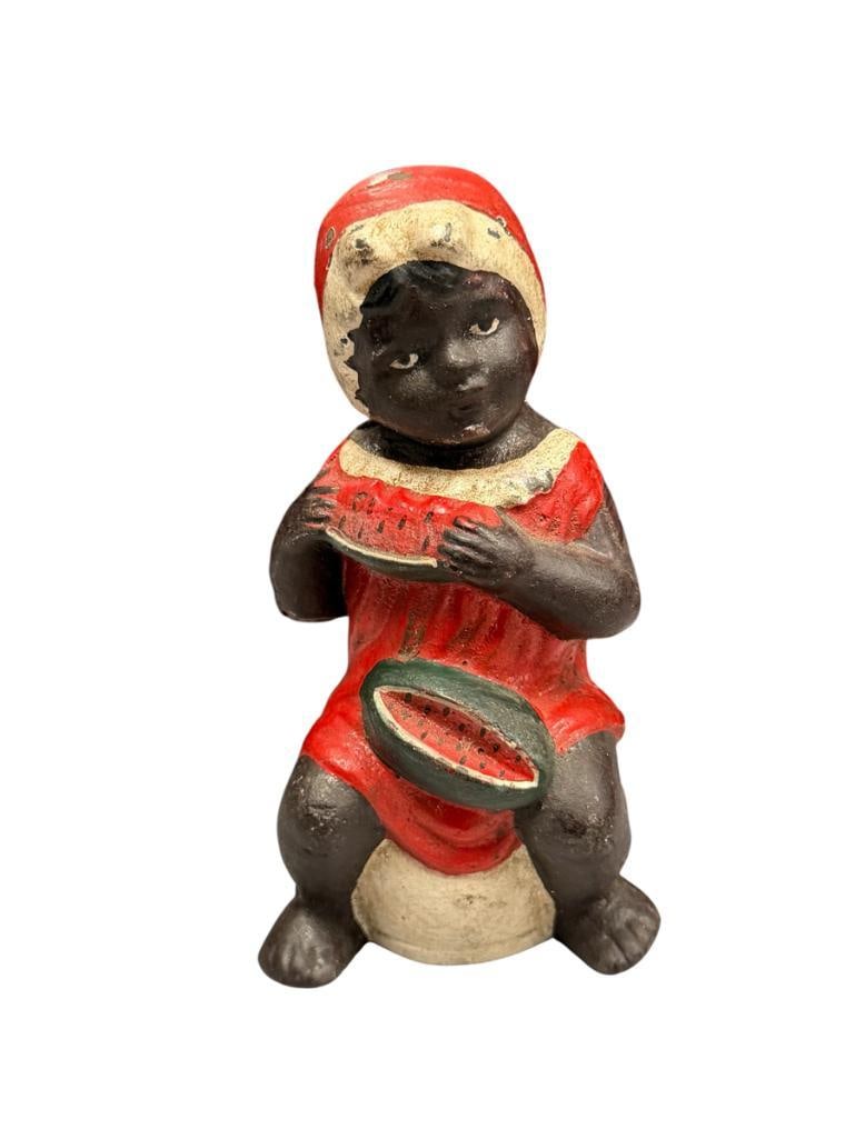 VINTAGE BLACK AMERICANA CAST IRON STILL COIN BANK OF YOUNG GIRL EATING WATERMELON (1 of 6)