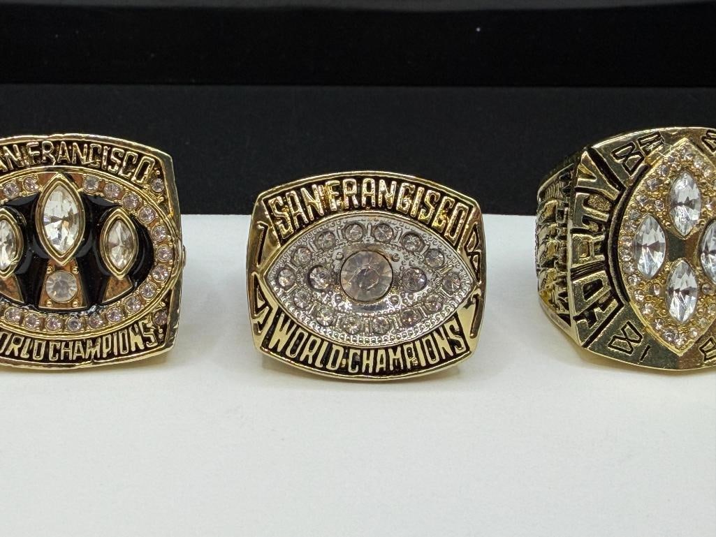 THREE SAN FRANCISCO 49ERS SUPER BOWL REPLICA RINGS INCLUDING JOE MONTANA AND JERRY RICE - 2