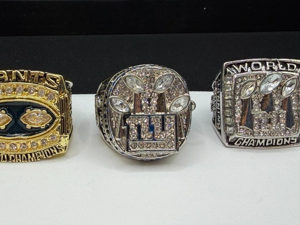THREE NEW YORK GINATS NFL SUPER BOWL CHAMPIONSHIP REPLICA RINGS INCLUDING ELI MANNINGS AND L. TAY... - 2