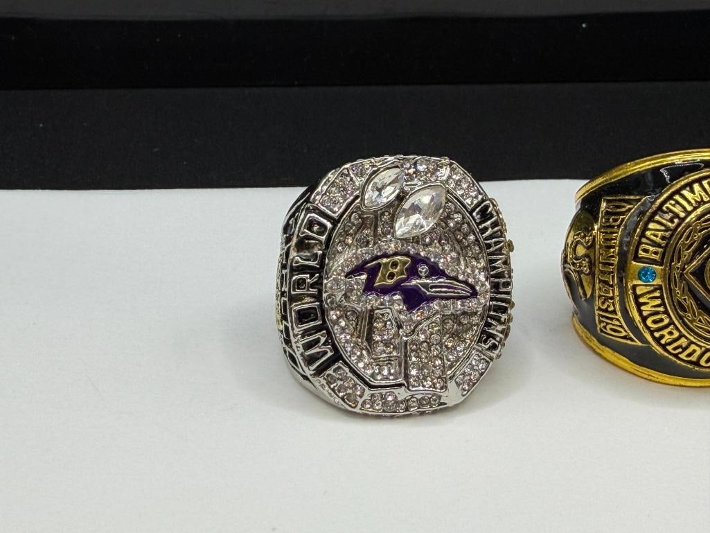 TWO NFL SUPER BOWL CHAMPIONSHIP REPLICA RINGS INCLUDING BALTIMORE RAVENS AND BALTIMORE COLTS - 2