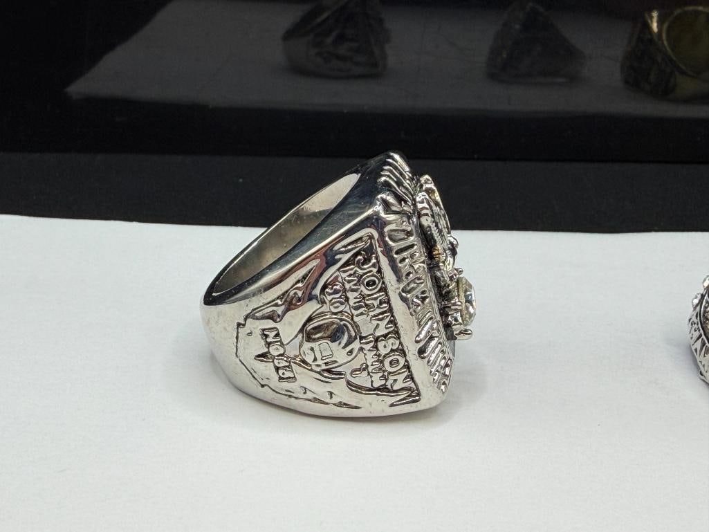 THREE NFL CHAMPIONSHIP REPLICA RINGS INCLUDING SEATLE SEAHAWKS SUPER BOWL REPLICA FROM 2013 - 5
