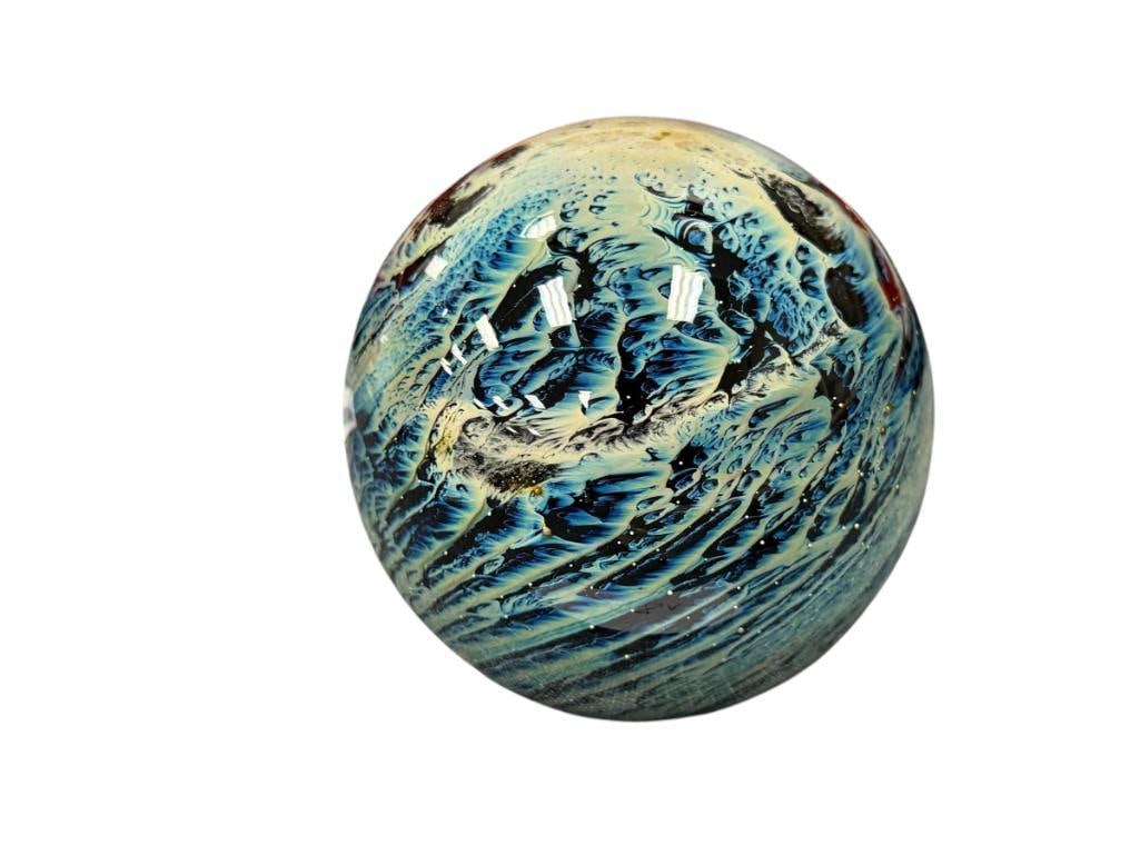JOSH SIMPSON STUDIO ART GLASS HAND BLOWN PAPERWEIGHT PLANET DESIGN WITH WAVE IMAGERY: SIGNED ON THE BOTTOM AND DATED, NO CHIPS OR SCUFFS 3 1/2" H