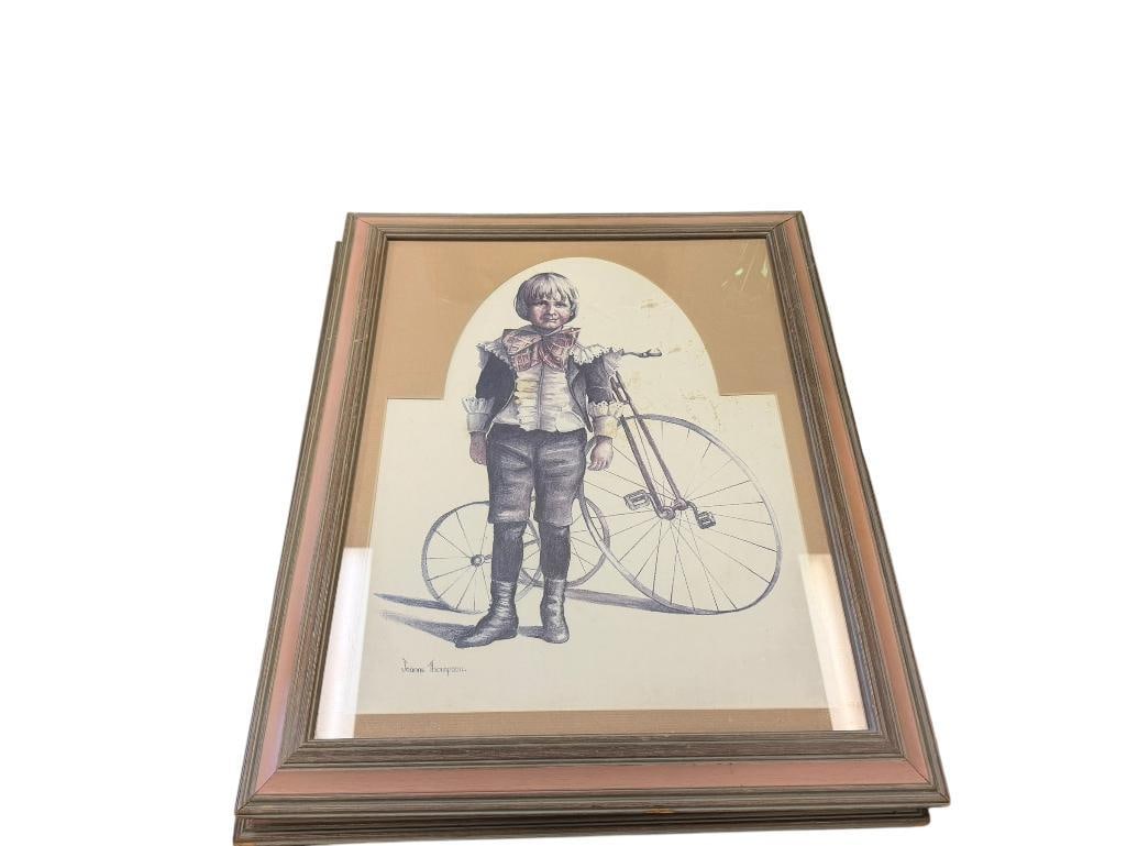 PAIR OF JOANNE THOMPSON VINTAG ESTYLE PRINTS OF BOY WITH BICYCLE AND GIRL WITH DOLL CARRIAGE: BOTH FRAMED AND MATTED 19" X 23"