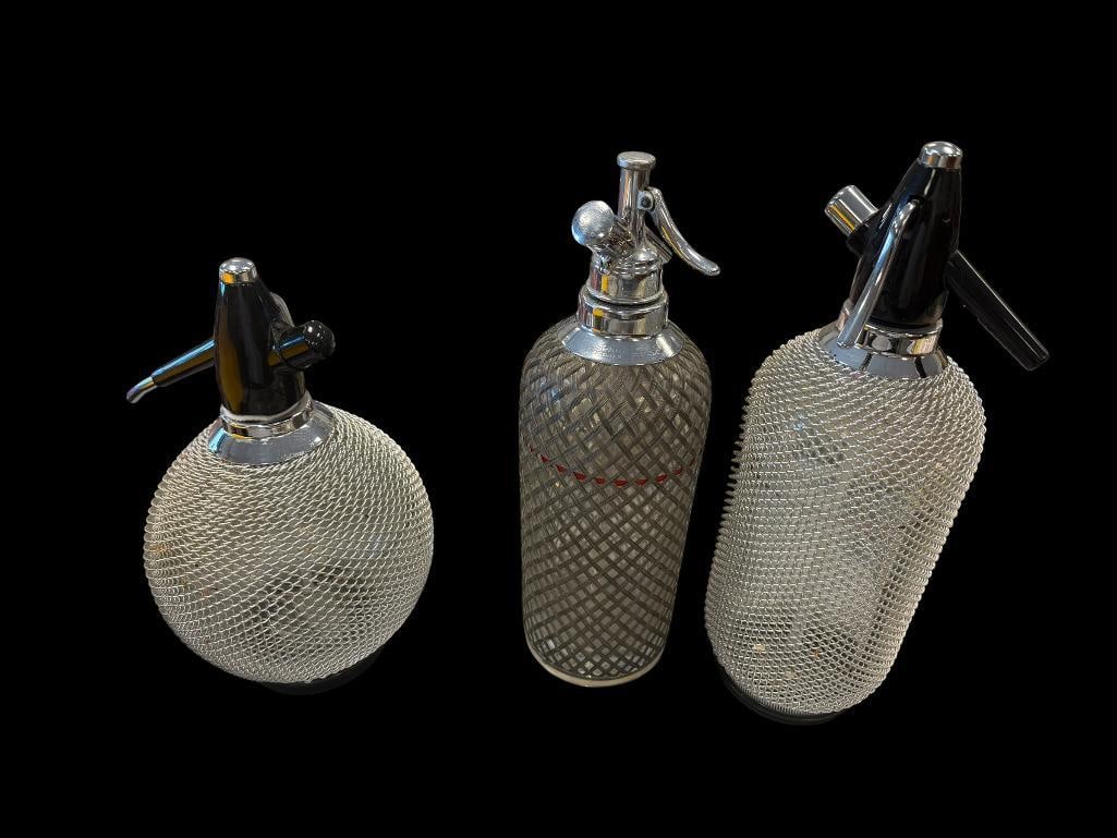 THREE VINTAGE SELTZER SODA SIPHON BOTTLES INCLUDING CZECHO MADE SPARKLE'S: ALL MARKED ON BOTTOMS WITH NUMBERS, GOOD CONDITION UP TO 14" H