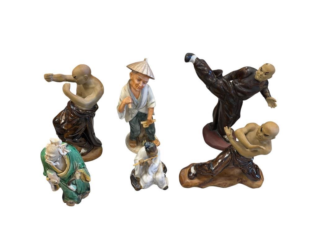 VINTAGE ASIAN PORCELAIN FIGURINES INCLUDING MUDMAN, SHIWAN KUNG FU SHAOLIN MONK, AND MORE: MOST ARE IN GOOD CONDITION, ONE MUDMAN HAS SIGNIFICANT DAMAGE, 1962 KELVIN'S JAPANESE FIGURINE, AND MORE LARGEST IS 8" H