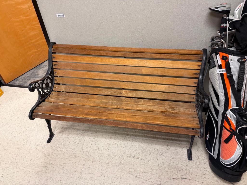 RUSTIC WOOD BENCH FEATURING BLACK CAST IRON LEGS WITH ORNATE DETAILS WITH LIONS AND FLORAL PATTERN - 2
