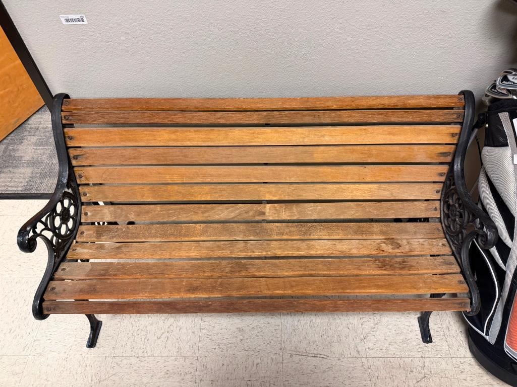 RUSTIC WOOD BENCH FEATURING BLACK CAST IRON LEGS WITH ORNATE DETAILS WITH LIONS AND FLORAL PATTERN - 5