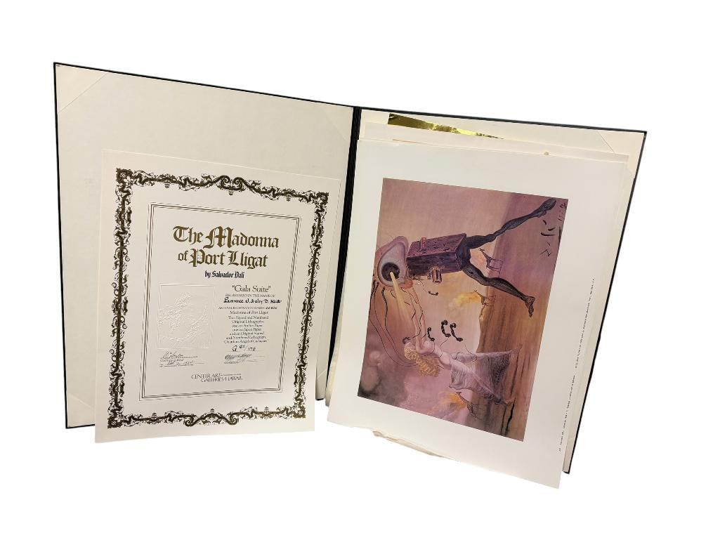 SALVADOR DALI ART PRINTS INCLUDING SALVADOR DALI " THE ANNUNCIATION " AND BILLY ROSE COLLECTION: INCLUDES SIX PRINTS, BILLY ROSE COLLECTION INCLUDES "BURNING GIRAFFES AND TELEPHONES," "MUSICAL TEMPTEST,"THE WEANING OF FURNITURE NUTRITION," AND MORE, IN HARD COVER DALI PROTECTIVE CASE FROM CENTER
