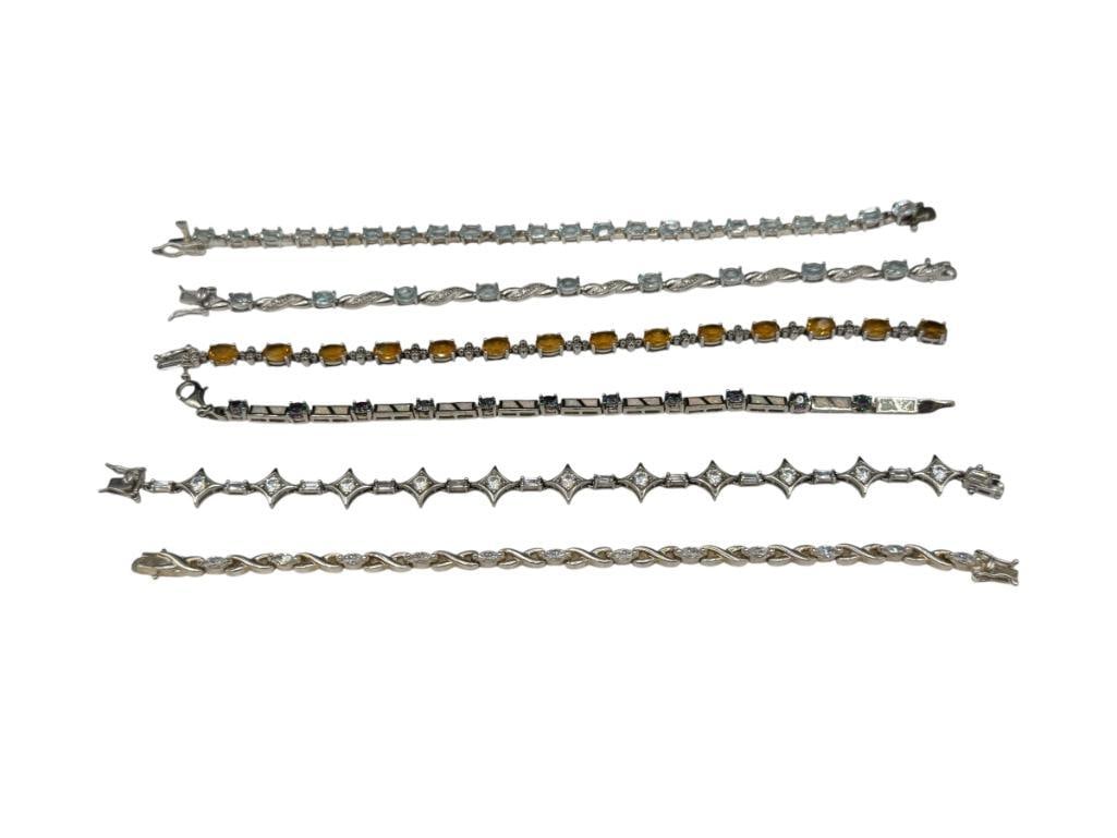 SIX STERLING SILVER TENNIS BRACELETS FEATURING BLUE TOPAZ, CITRINE, CZS, AND OPALITE (1 of 7)