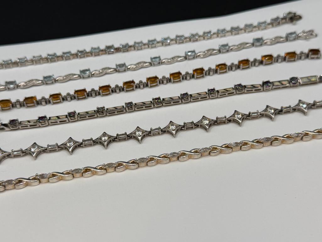 SIX STERLING SILVER TENNIS BRACELETS FEATURING BLUE TOPAZ, CITRINE, CZS, AND OPALITE - 2