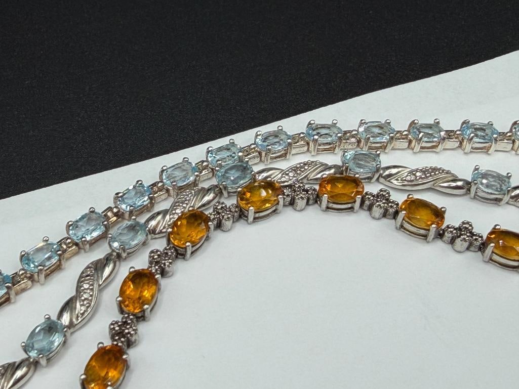 SIX STERLING SILVER TENNIS BRACELETS FEATURING BLUE TOPAZ, CITRINE, CZS, AND OPALITE - 4
