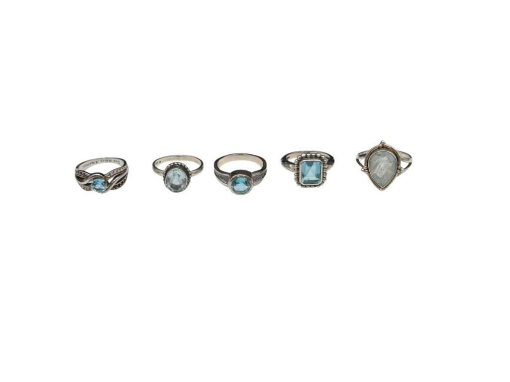 FIVE STERLING SILVER BLUE TOPAZ AND BLUE STONE RINGS (1 of 8)