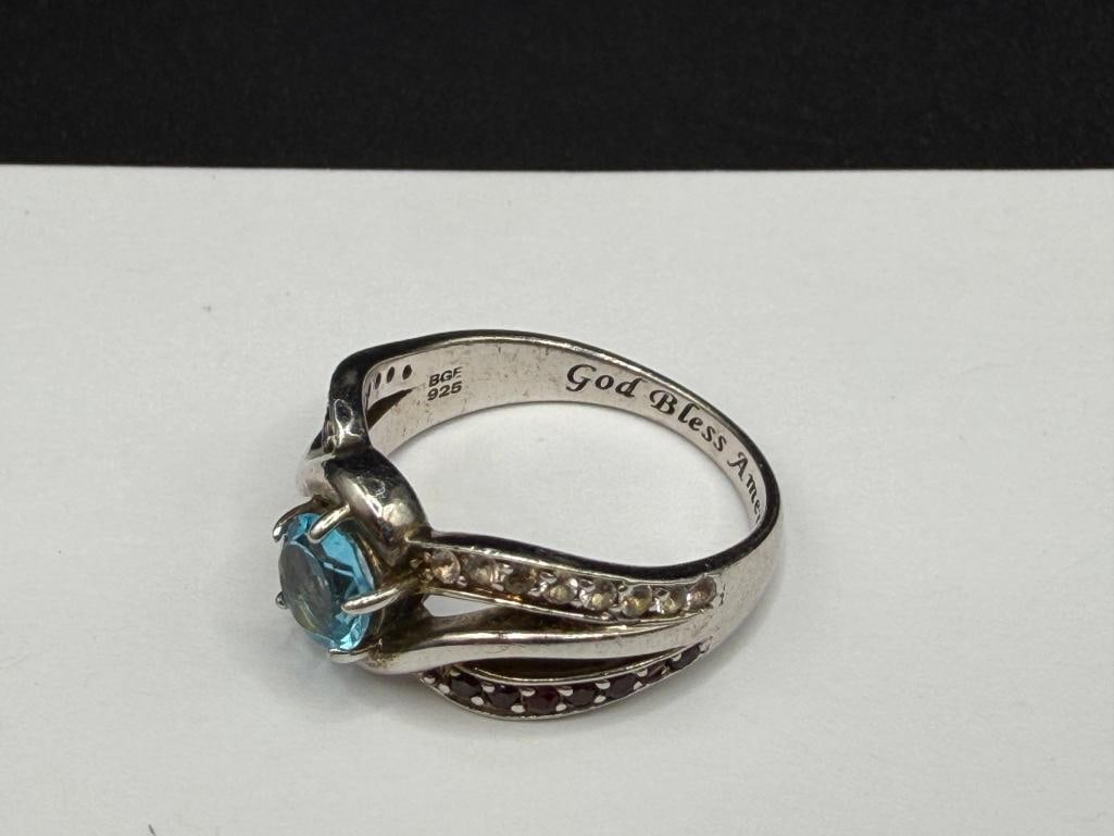 FIVE STERLING SILVER BLUE TOPAZ AND BLUE STONE RINGS - 3
