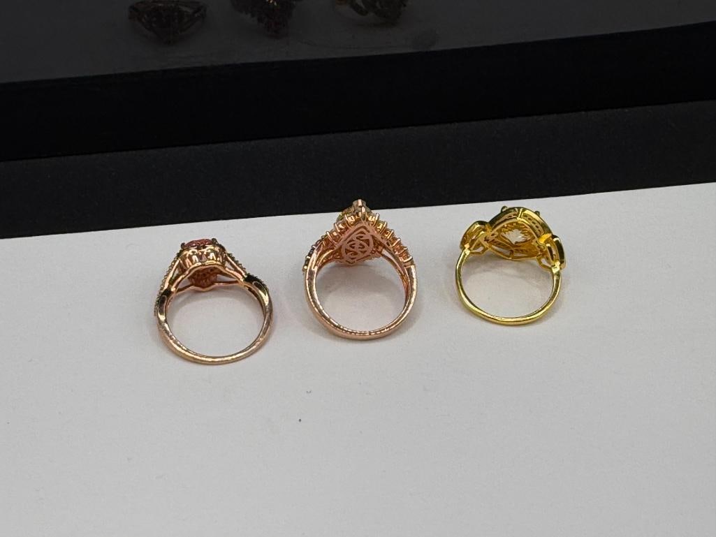 THREE STERLING SILVER ROSE GOLD PLATED AND GOLD-PLATED CZ FASHION RINGS - 5