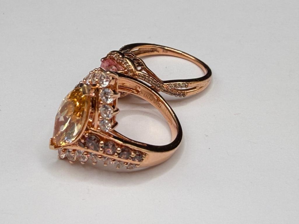 THREE STERLING SILVER ROSE GOLD PLATED AND GOLD-PLATED CZ FASHION RINGS - 7