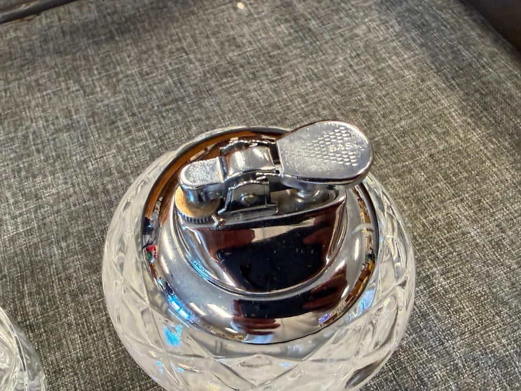 THREE VINTAGE GLASS TABLE LIGHTERS WITH CHROME TOPS INCLUDING RONSON LIGHTER - 12