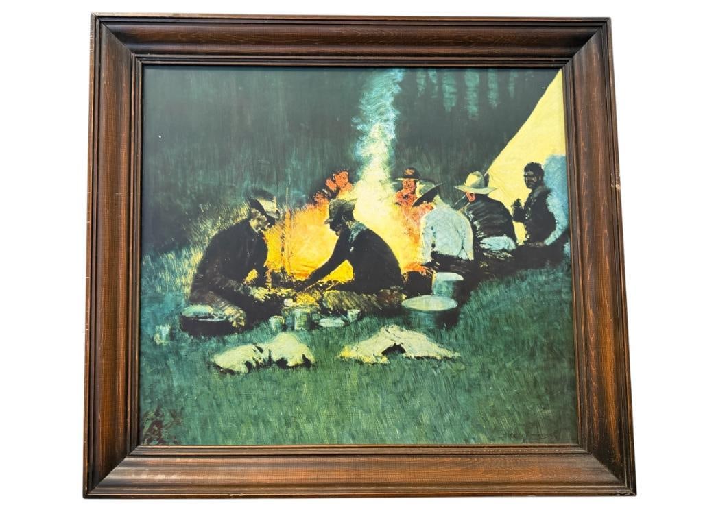 FREDERIC REMINGTON RENOWNED AMERICAN ARTIST PRINT ON CANVAS TITLED HUNTER'S SUPPER: ART DEPICTS MEN GATHERED AROUND A CAMPFIRE MAKING SUPPER, PLATE SIGNED LOWER RIGHT, FRAMED 26" X 23" FRAME